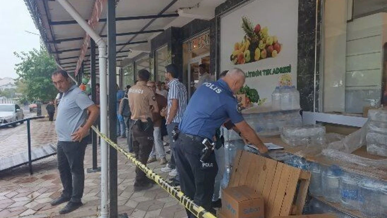 Marketi silahla basan koca, eşini öldürüp intihar etti!
